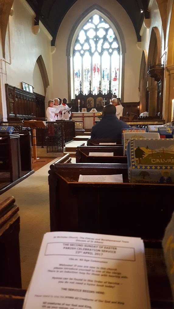 Clergy at the altar during a parish celebration service